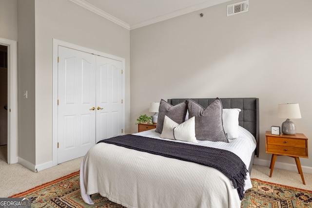 bedroom with light carpet, a closet, and ornamental molding