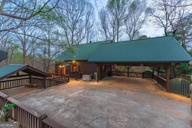 exterior space with a carport