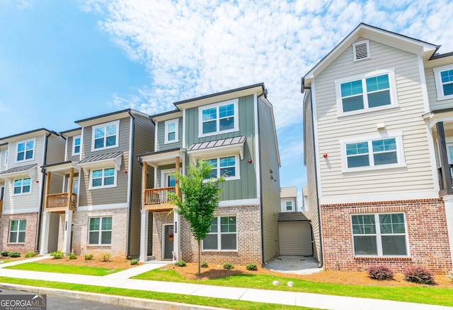 multi unit property featuring a balcony