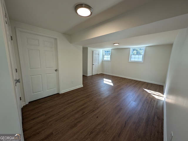 basement featuring dark hardwood / wood-style floors