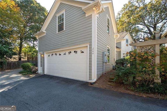 view of home's exterior featuring a garage