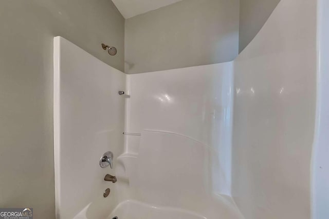 bathroom featuring shower / washtub combination