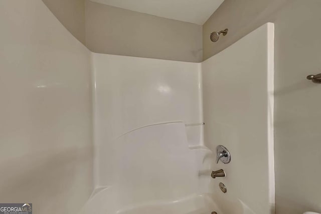 bathroom with shower / tub combination