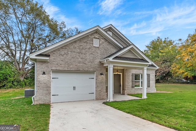 craftsman-style home featuring central AC, a front lawn, and a garage