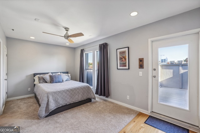 bedroom featuring ceiling fan and light hardwood / wood-style flooring