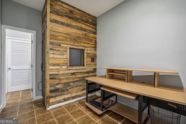 dining area with wood walls