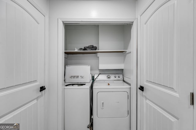 laundry area with separate washer and dryer