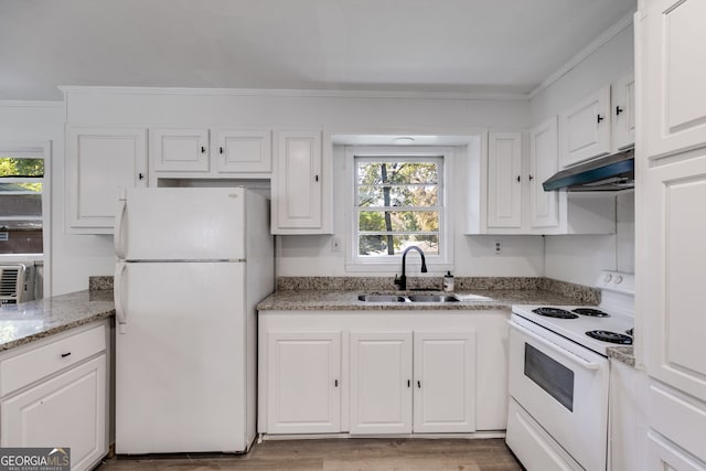 kitchen featuring white cabinets, wood-type flooring, ornamental molding, sink, and white appliances