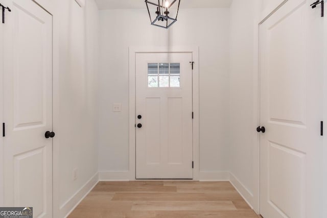 entrance foyer with light hardwood / wood-style flooring