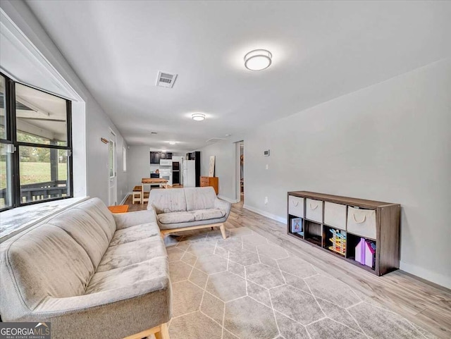 living room with light wood-type flooring