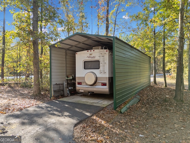 view of outdoor structure with a carport