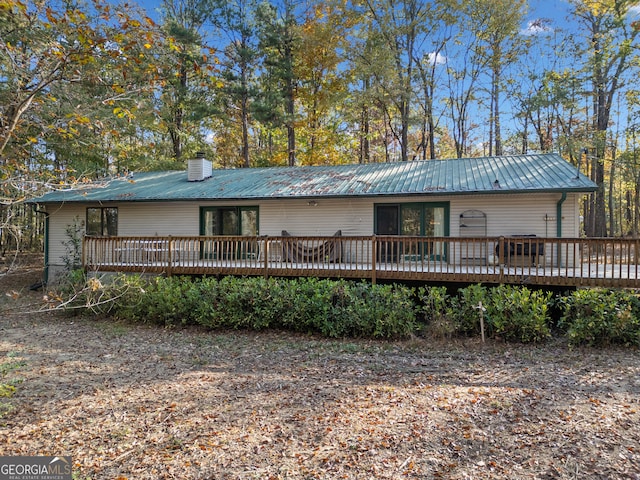 view of front of home featuring central AC and a wooden deck