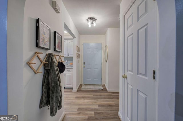 hall featuring light hardwood / wood-style floors