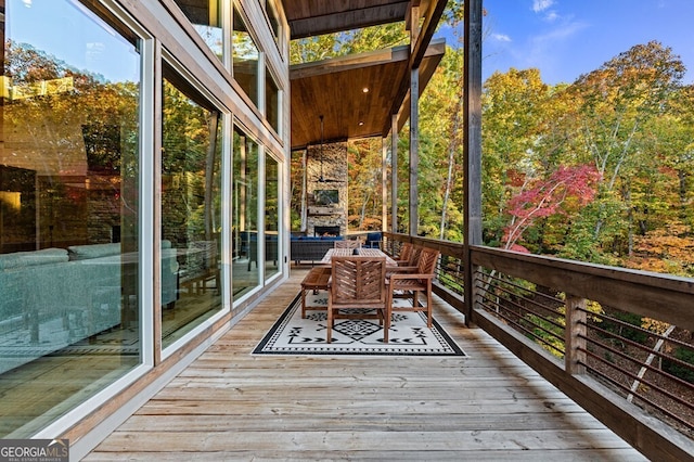 deck with an outdoor hangout area