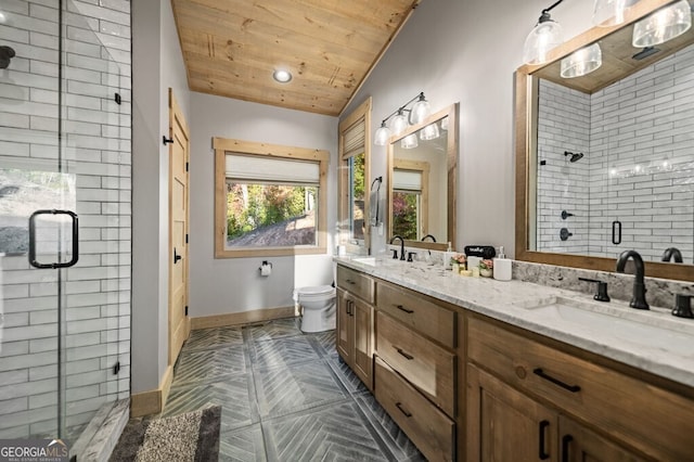 bathroom with lofted ceiling, wood ceiling, toilet, vanity, and an enclosed shower