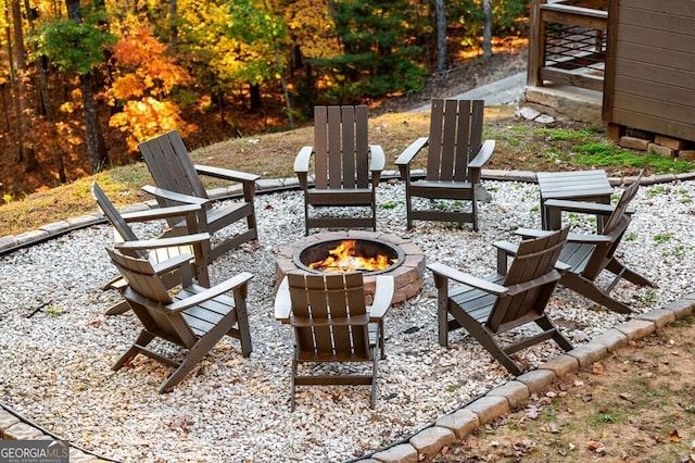 view of patio / terrace with an outdoor fire pit