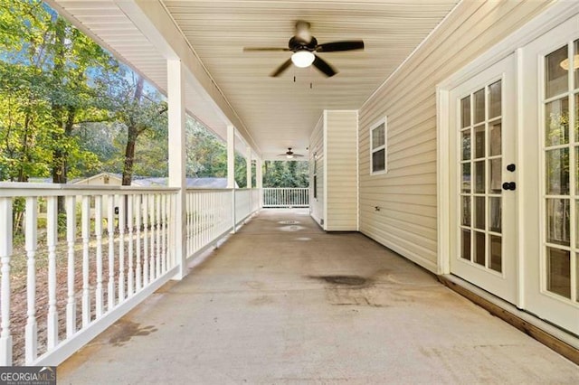 view of patio featuring french doors and ceiling fan