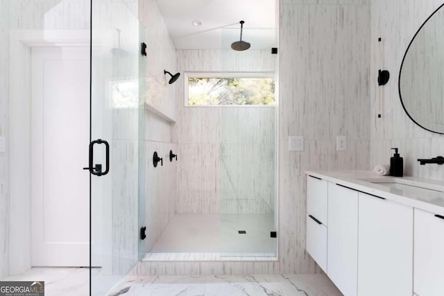 1281 Avalon Pl NE, Atlanta, GA 30306 - full bath featuring vanity, a marble finish shower, and tile walls