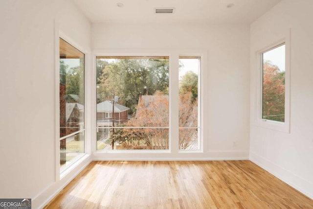 doorway with light wood-type flooring