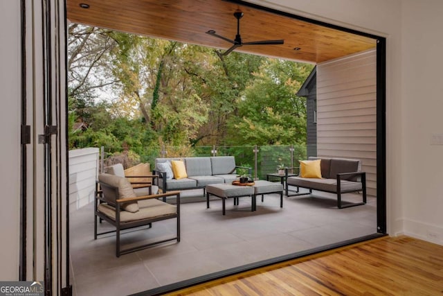 view of patio featuring ceiling fan and an outdoor living space