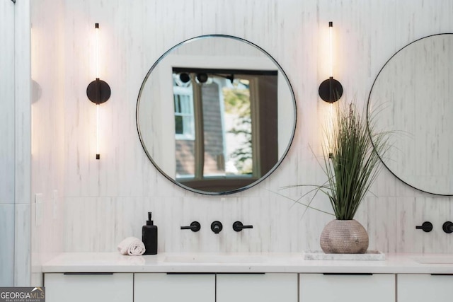 1281 Avalon Pl NE, Atlanta, GA 30306 - bathroom with double vanity and tasteful backsplash