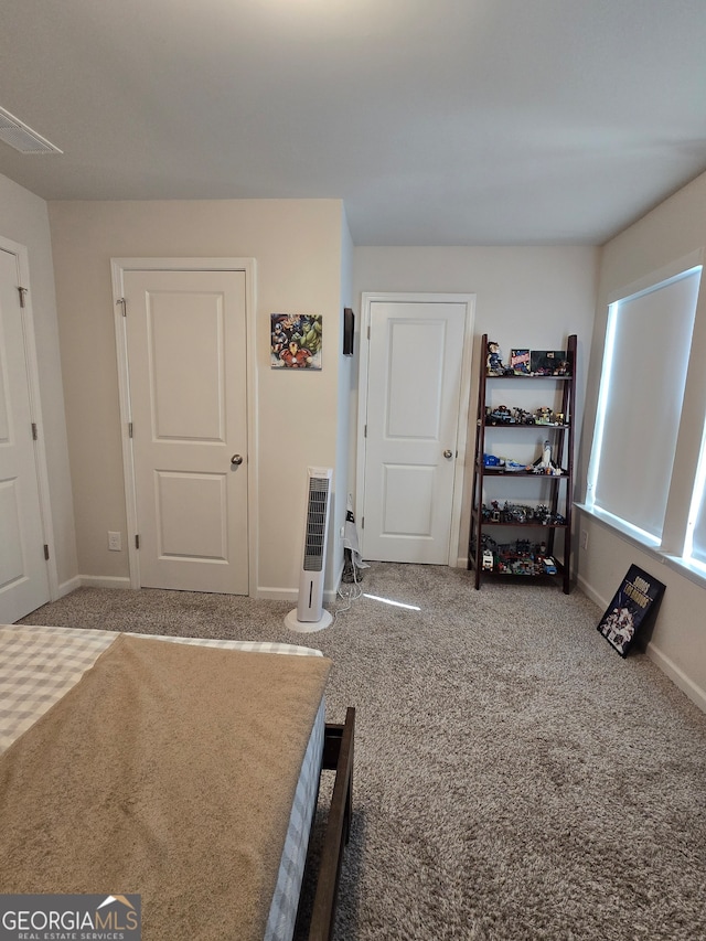 unfurnished bedroom featuring carpet flooring