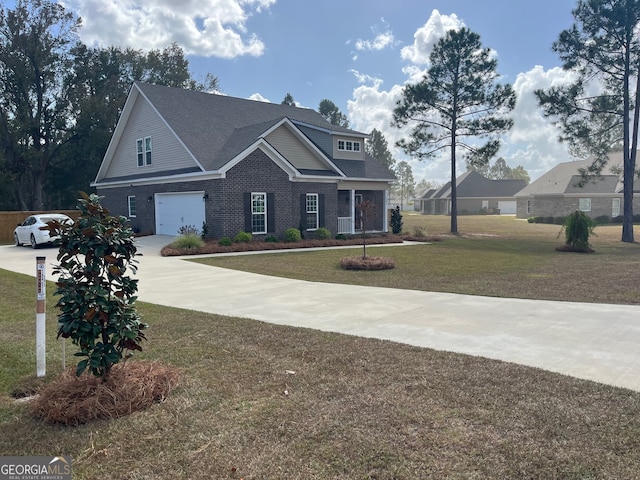 view of front facade featuring a front lawn and a garage