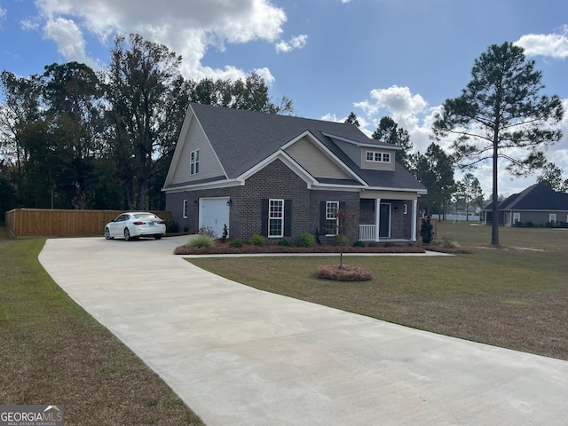 view of front facade featuring a front yard and a garage