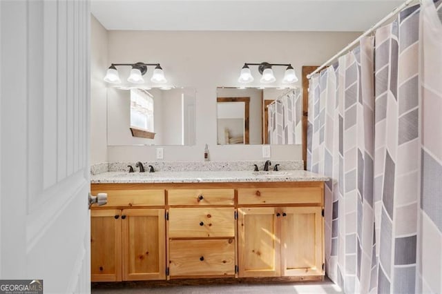 bathroom with vanity and walk in shower