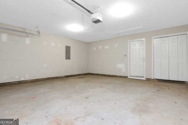 garage featuring a garage door opener and electric panel