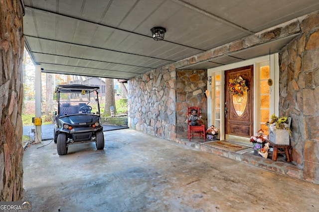 garage featuring a carport