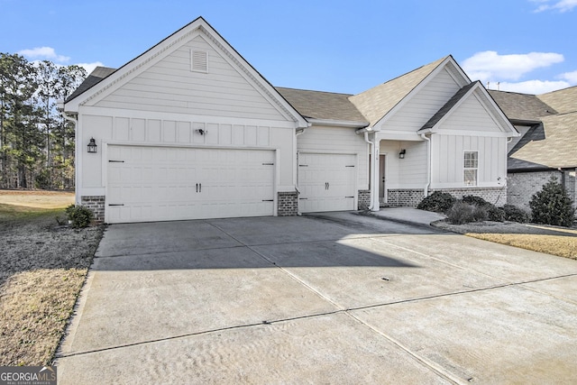 ranch-style house featuring a garage