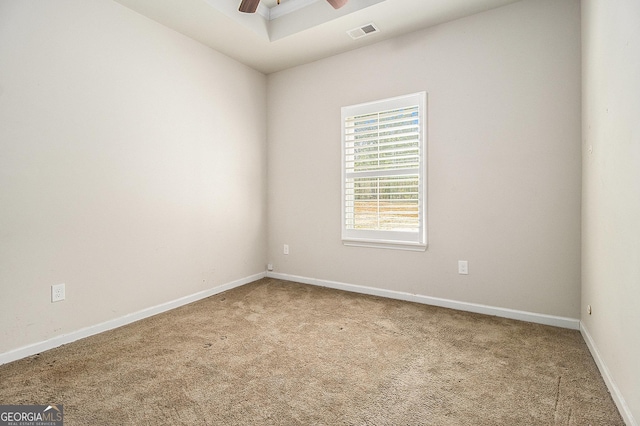 carpeted empty room with ceiling fan