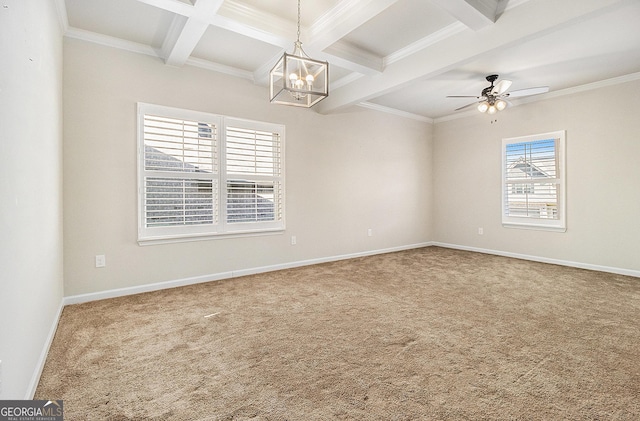 unfurnished room with coffered ceiling, ceiling fan with notable chandelier, crown molding, carpet flooring, and beam ceiling