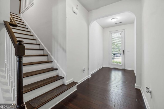 entrance foyer featuring dark hardwood / wood-style flooring