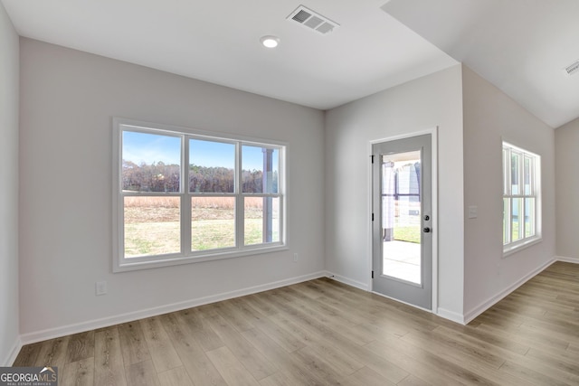 entryway with light hardwood / wood-style flooring