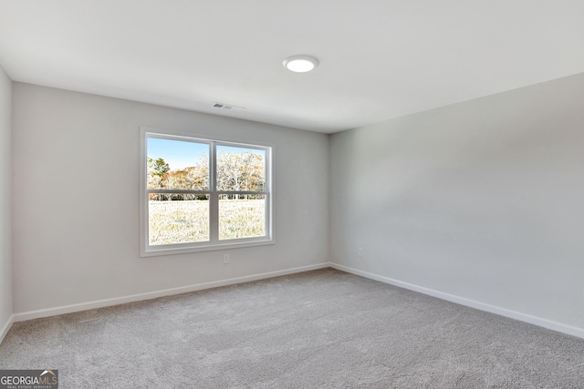 spare room with carpet flooring