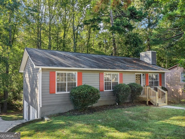 view of front of home with a front lawn