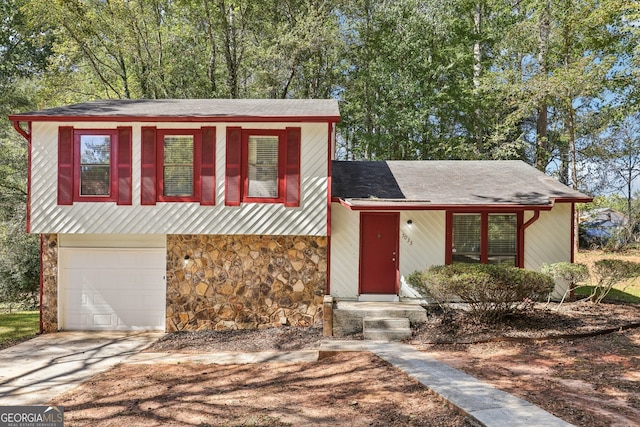 split level home with a garage