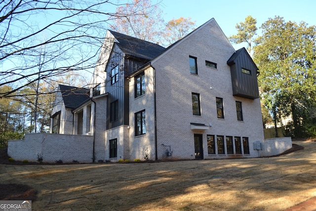 view of property exterior with a yard