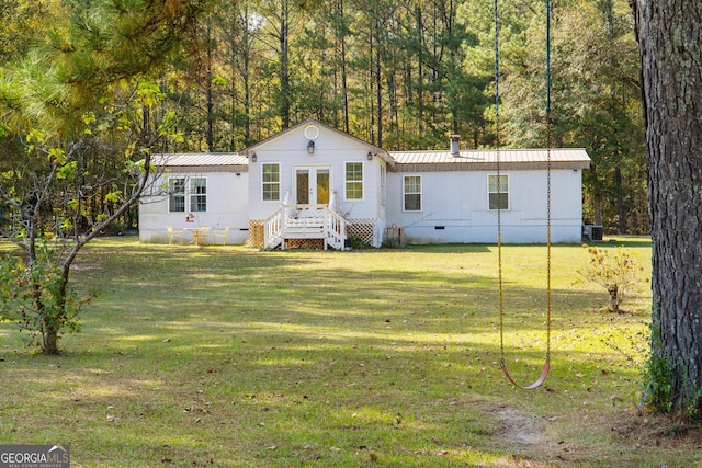 view of front of home with a front yard