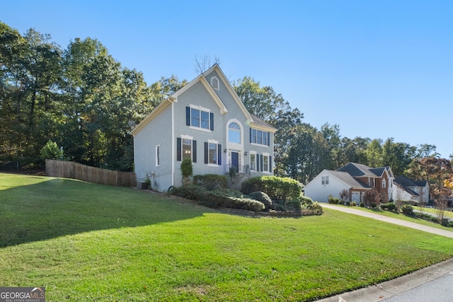 view of front of home with a front lawn