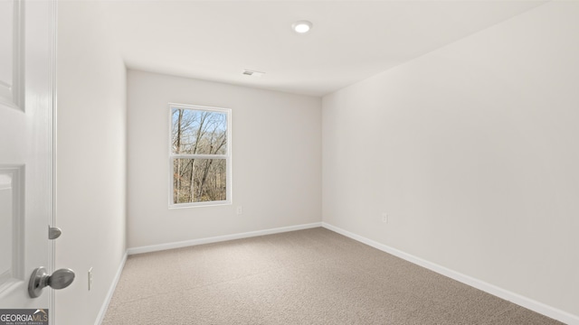 353 Sound Cir, Stockbridge, GA 30281 - carpeted empty room featuring baseboards