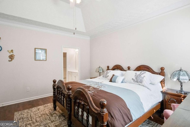 bedroom featuring ornamental molding, ensuite bathroom, hardwood / wood-style flooring, and ceiling fan