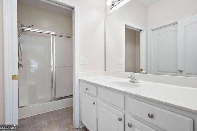 bathroom featuring vanity and walk in shower