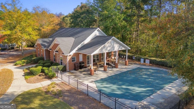 view of pool with a patio area