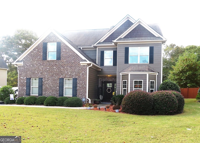 view of front of home with a front lawn