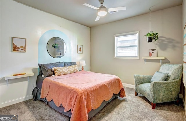 bedroom with ceiling fan and carpet flooring