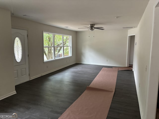 foyer featuring ceiling fan and dark hardwood / wood-style flooring