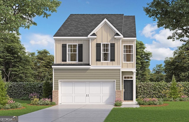 view of front of property featuring a garage and a front yard